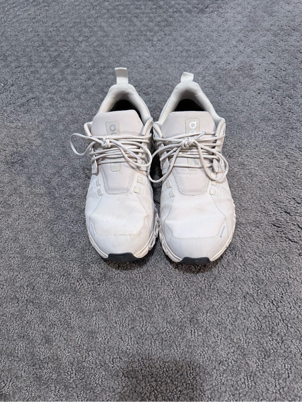 Cream on cloud water proof sneakers